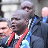 Minister of Justice and Correctional Services of South Africa Ronald Lamola answers the questions of press members related to the public hearings of South Africa’s genocide case against Israel at the International Court of Justice (ICJ) in The Hague, Netherlands, on January 11, 2024. (Photo: Dursun Aydemir/Anadolu via Getty Images)